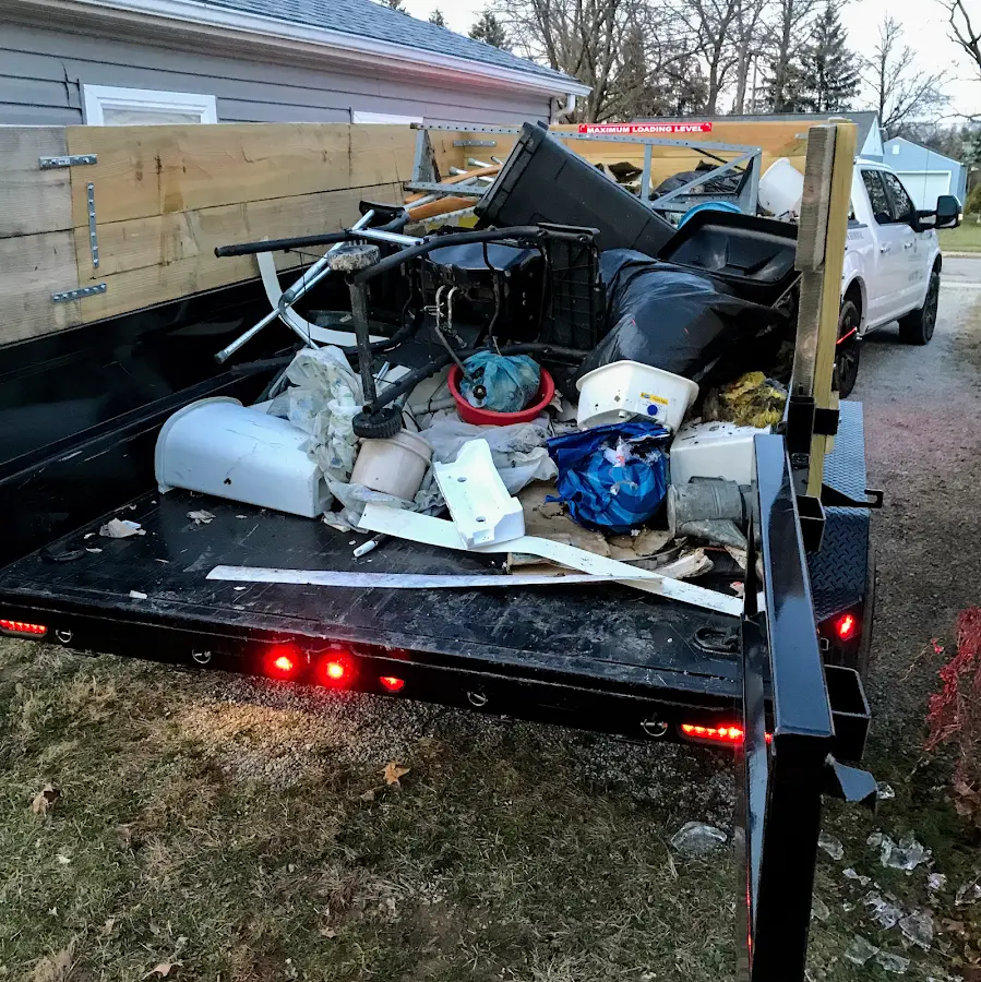 Roll-off dumpster delivered to a residential driveway in Progreso